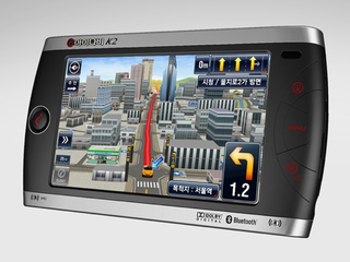 Illustration for article titled Thinkware iNAVI K2 GPS Makes Navigation Look Like a Game
